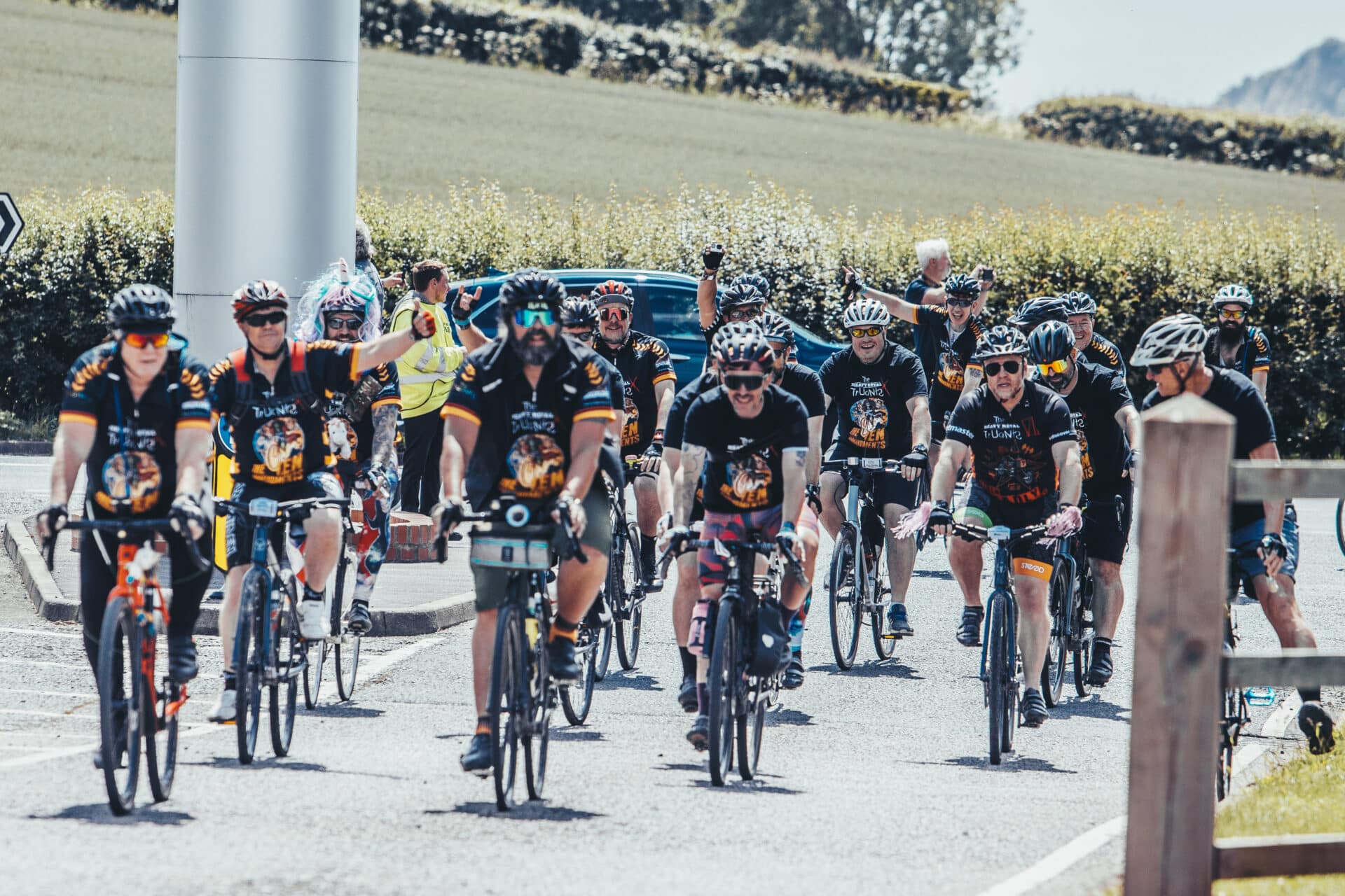 The Heavy Metal Truants, a group of music-loving fundraisers, complete the 175-mile cycle from London to Castle Donington for the annual Download festival