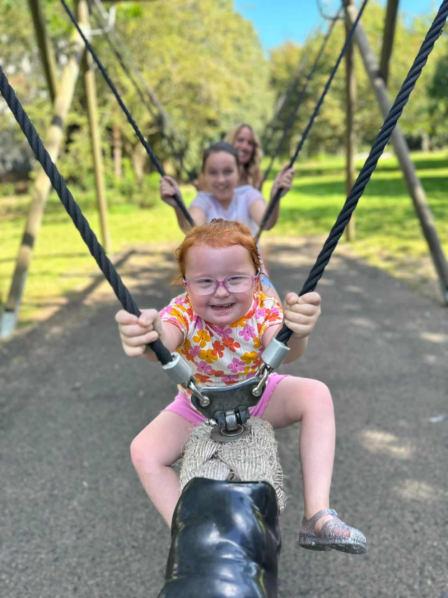 Emmie playing with her sister Evie