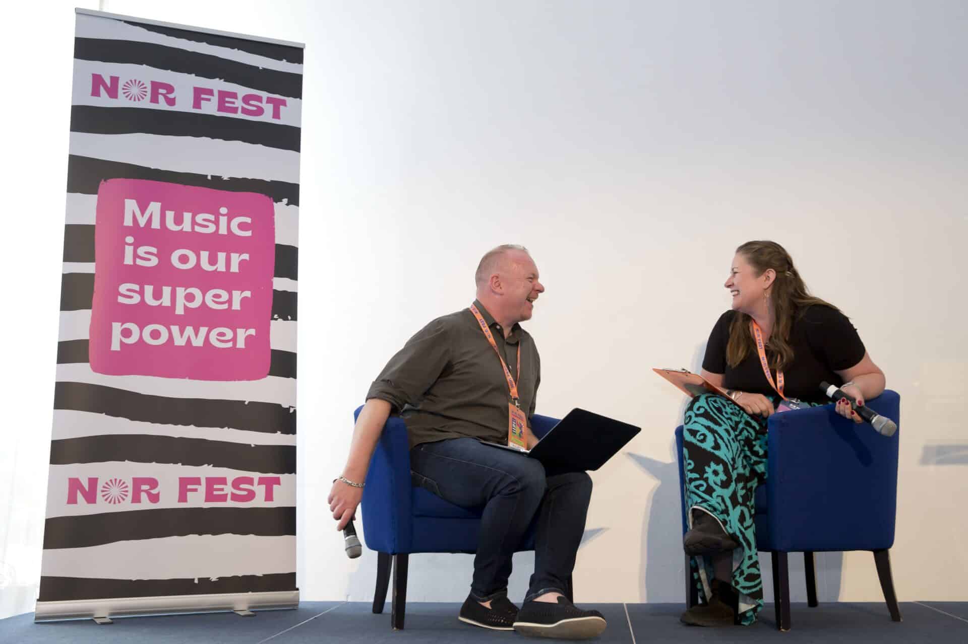 Alan laughing together with Tracey at NorFest, the annual Nordoff and Robbins staff conference.