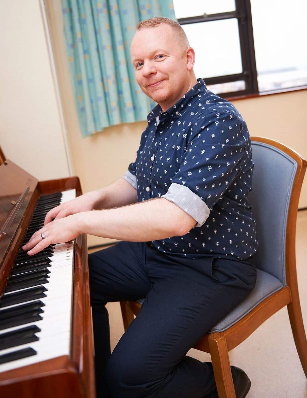 Alan playing the piano