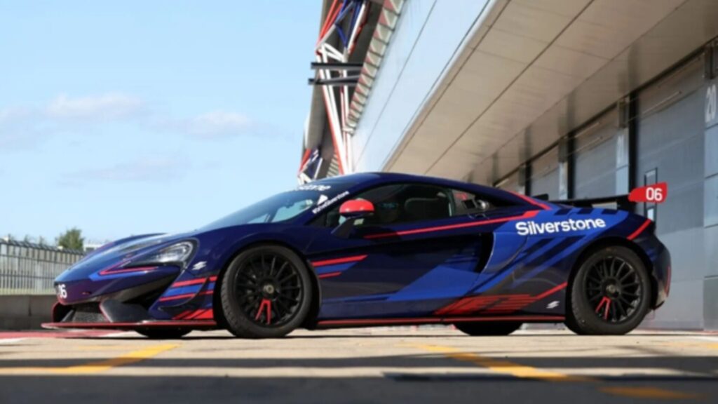 A blue McLaren race car with red and blue detailing